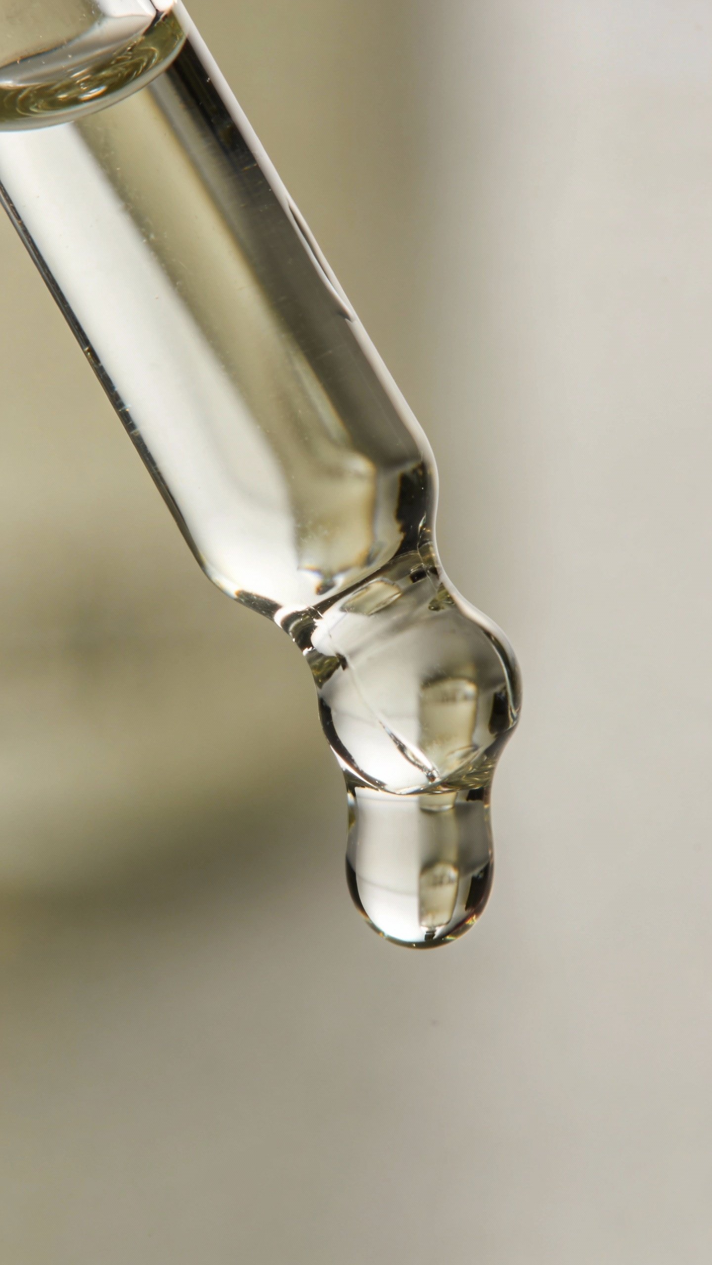 single drop of 2% salicylic acid on glass dropper tip