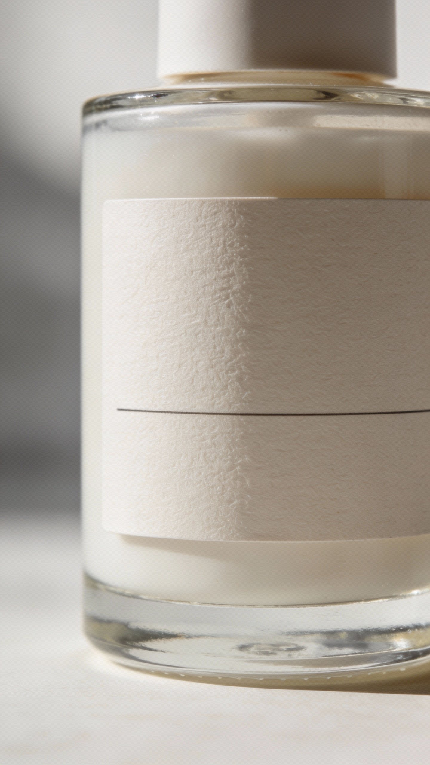 closeup of fragrance-free label on minimalist skincare bottle