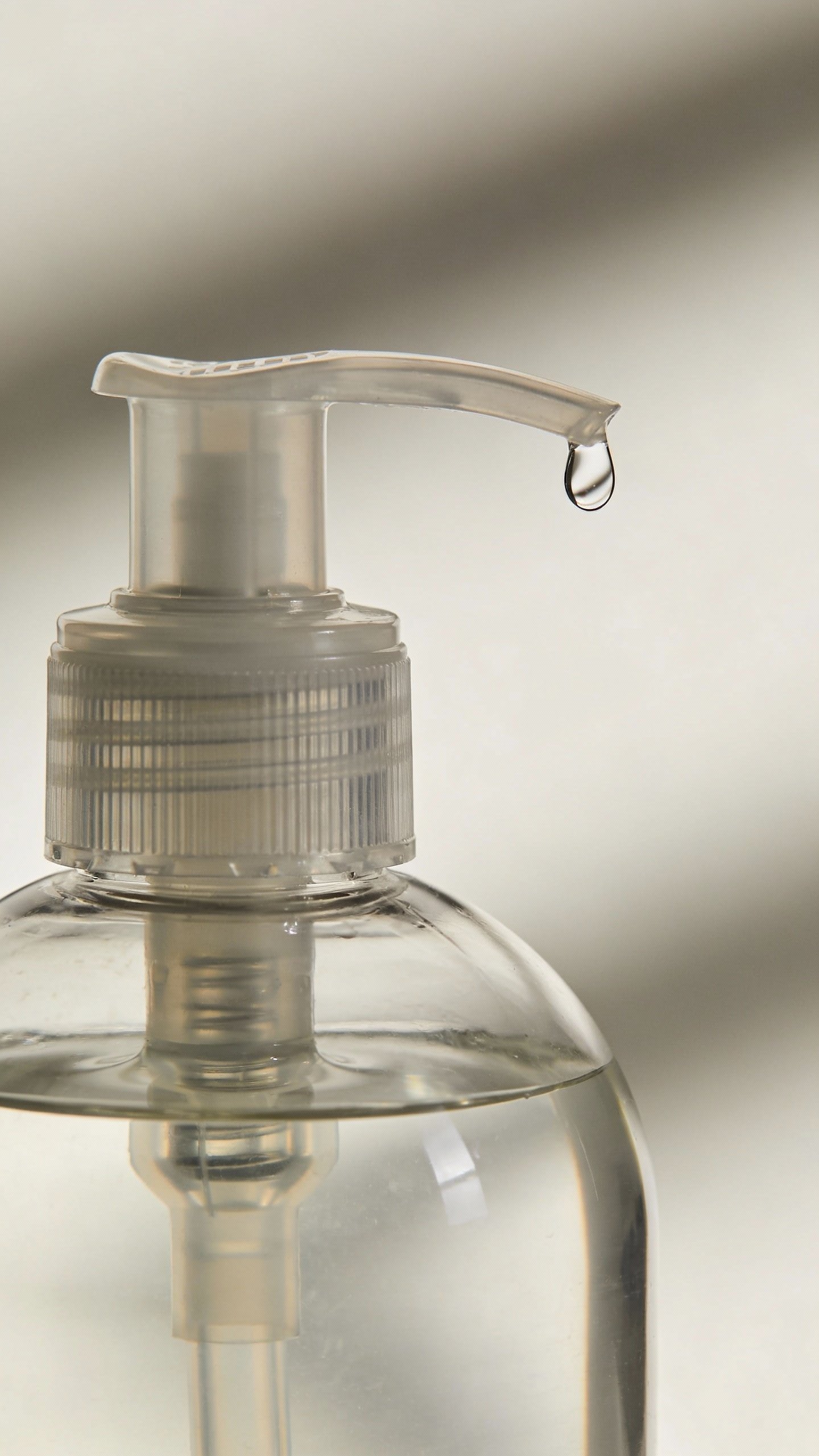 closeup of 70% isopropyl alcohol bottle with pump