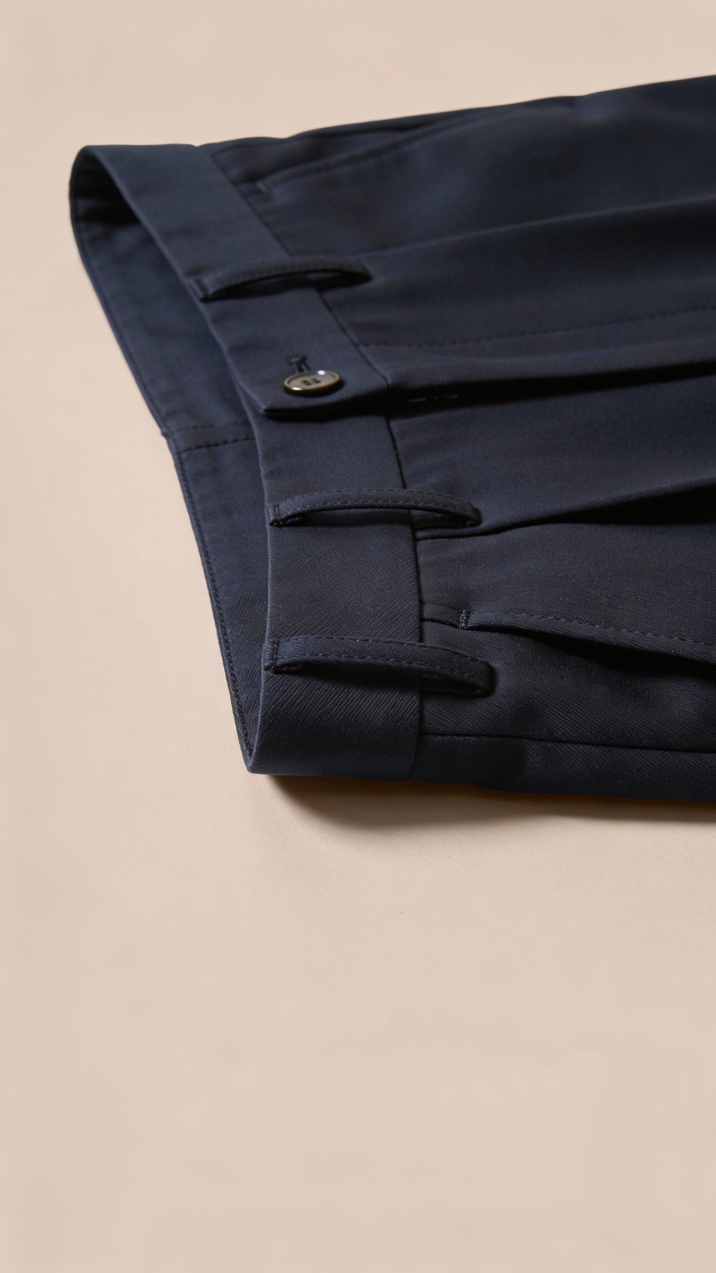 navy straight-leg trouser waistband with belt loops, closeup