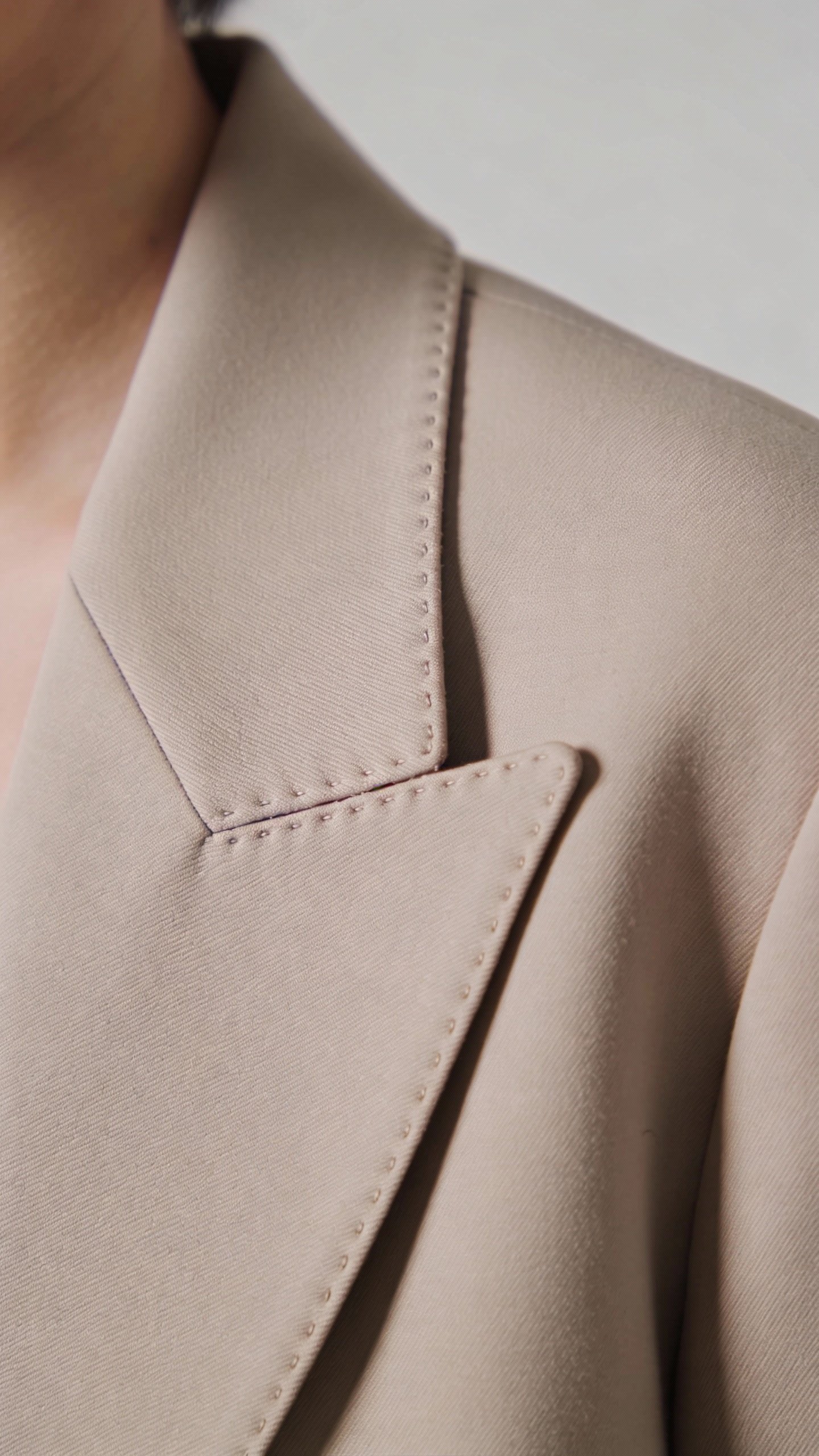 shoulder seam aligning perfectly on a structured blazer